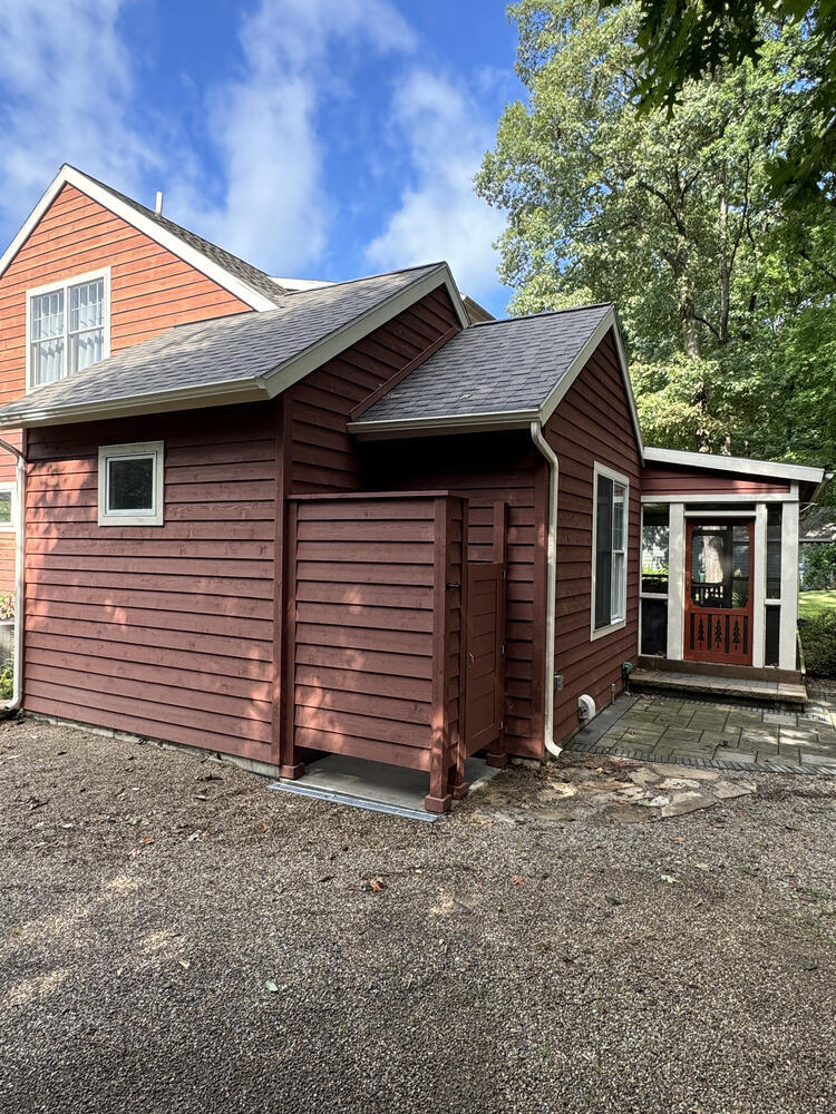 Barbour Construction’s exterior shower installation in Buchanan, MI featuring wood paneling.