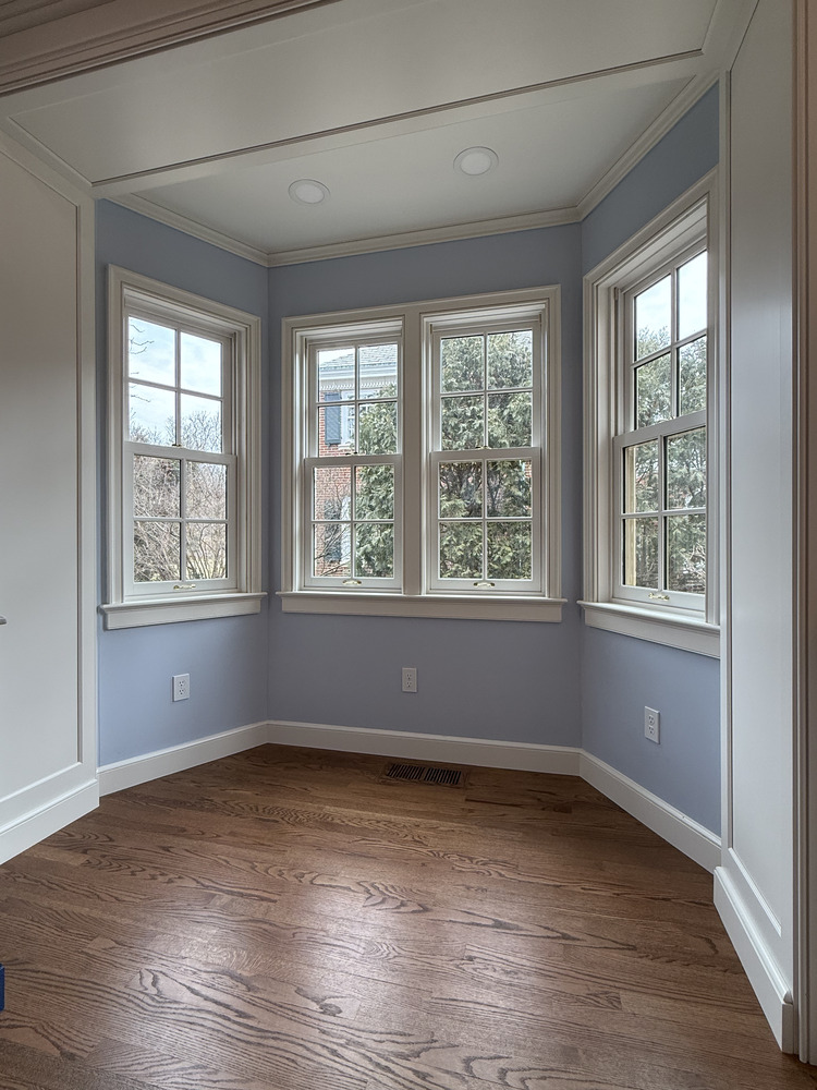 Bay window nook with hardwood floors in a South Bend custom home by Barbour Construction