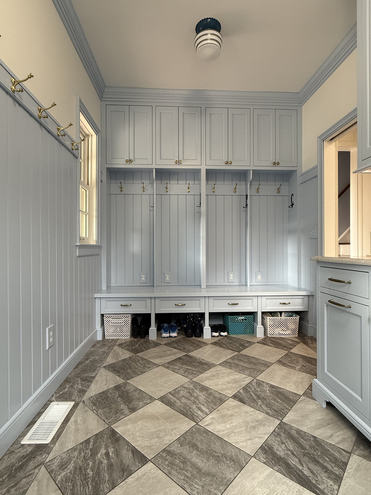 Built-in blue mudroom lockers and storage cabinets by Barbour Construction in South Bend, IN