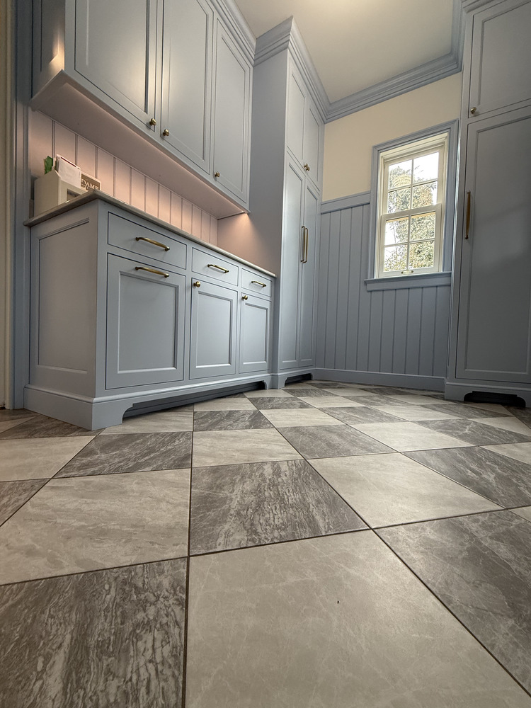Close-up of custom tile flooring in South Bend mudroom by Barbour Construction