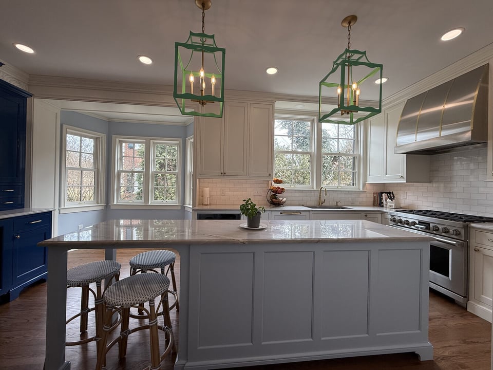 Elegant kitchen remodel with farmhouse sink and modern range in South Bend by Barbour Construction