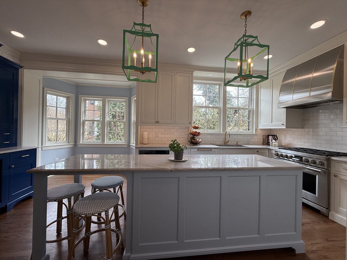 Elegant kitchen remodel with farmhouse sink and modern range in South Bend by Barbour Construction