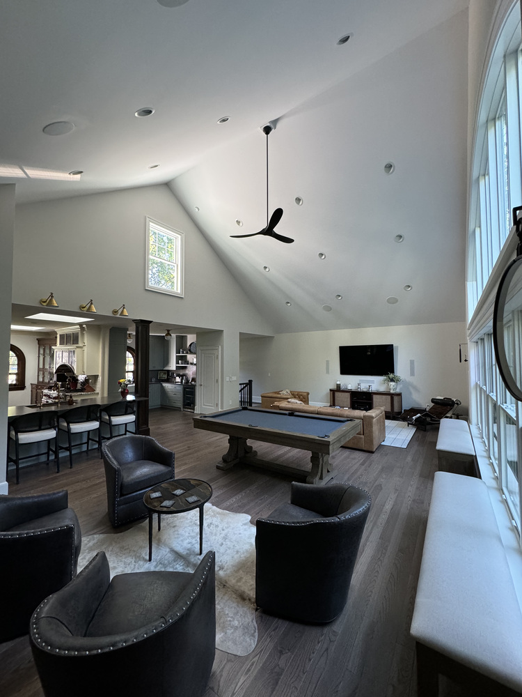 Custom game room with pool table and sitting area by Barbour Construction in South Bend, IN