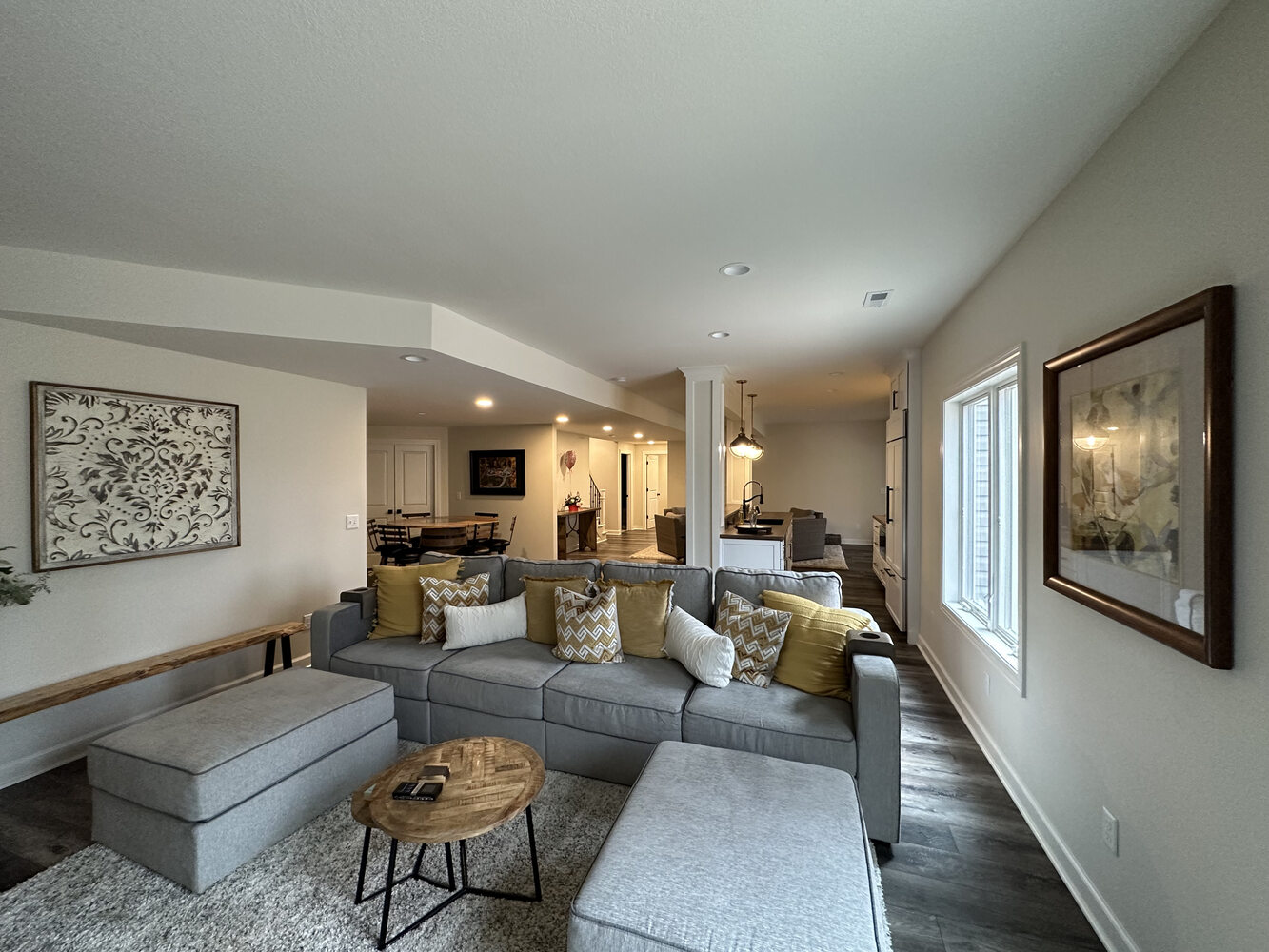 Spacious living area with modern decor in New Carlisle custom home by Barbour Construction.