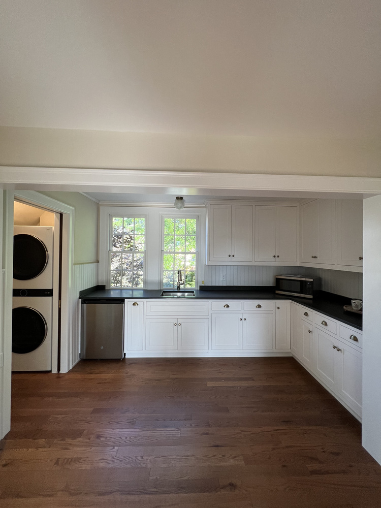 Kitchenette with upper and lower cabinetry in custom home by Barbour Construction in South Bend, IN.