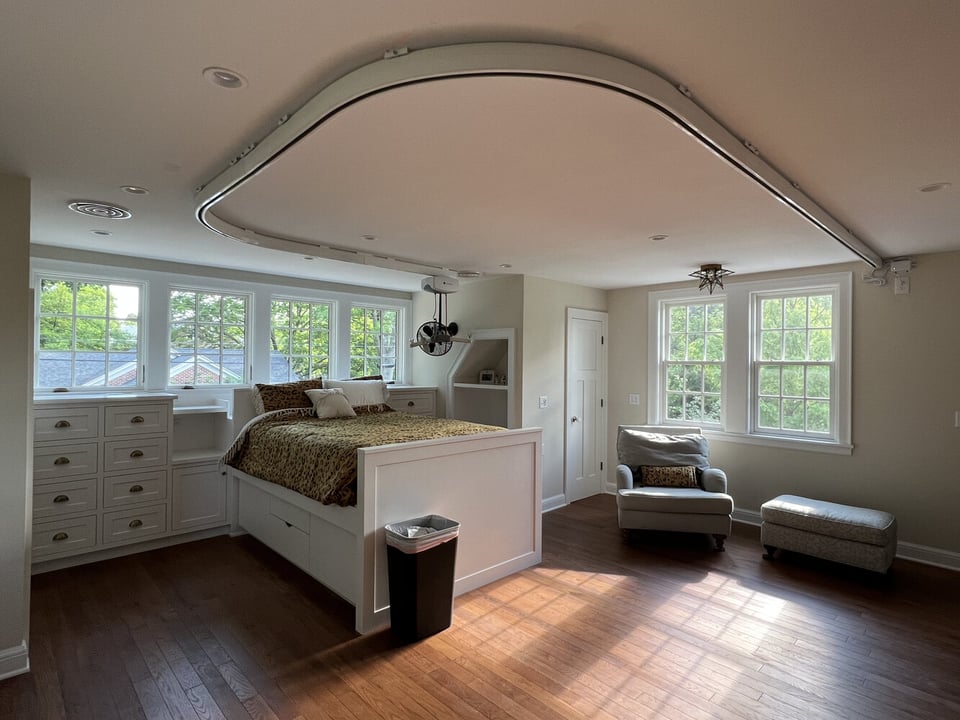 Spacious bedroom with built-in bed and natural light in South Bend home by Barbour Construction.