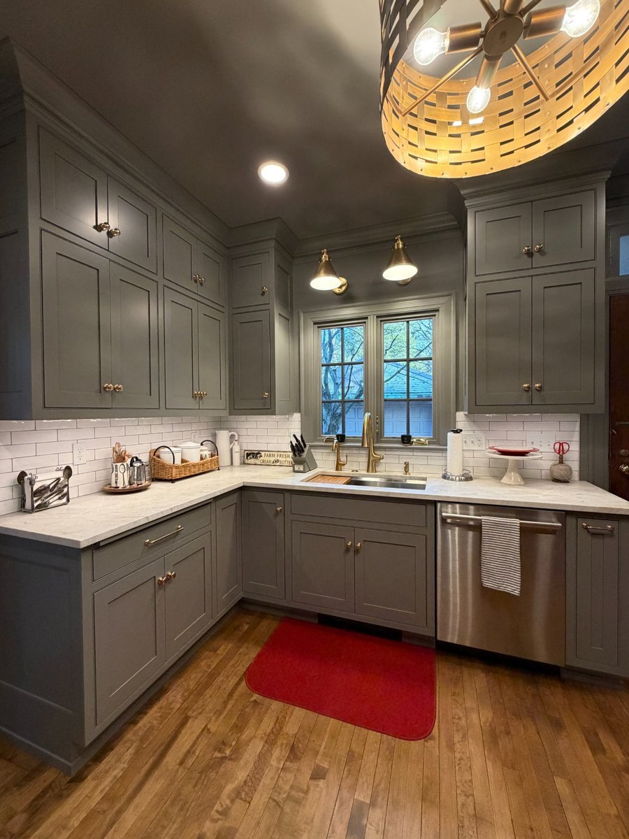 south bend kitchen remodel sink wall brass faucet upper cabinets closeup