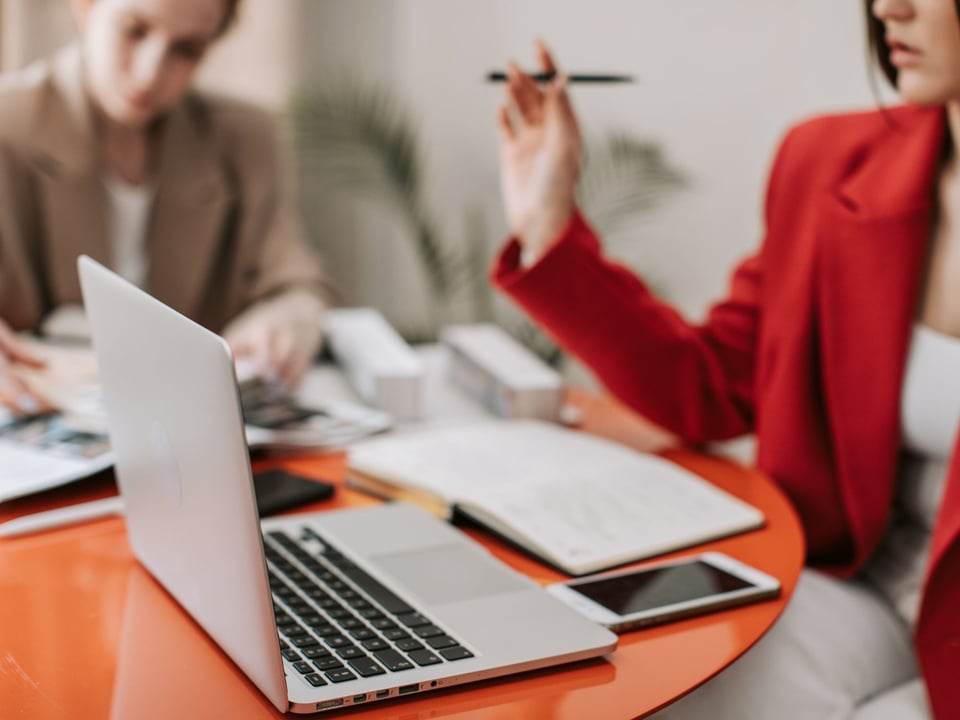 Stock Image of Homeowner Planning A Remodel Project on a Laptop 